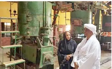 Ms. Samia Al Tayeb Al Khalifa Hassan on the floor of the Sennar mill